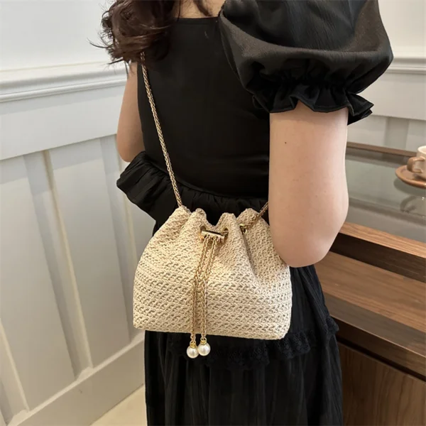 Ladies' mini straw woven bucket crossbody bag, hand woven pearl decoration drawstring straw woven small bag, gold chain shoulder bag, summer beach vacation special view 3