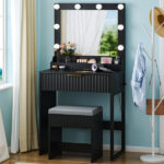 Black particleboard with a 3-compartment, 1-drawer dressing table set with 8 three-tone light bulbs, power strip, and grille series