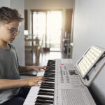[Do Not Sell on Amazon] GEP-110 61 Key Lighting Keyboard with Piano Stand, Piano Bench, Built In Speakers, Headphone, Microphone, Music Rest, LED Screen, 3 Teaching Modes for Beginners - Image 9
