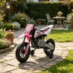 Pink 12V Kids Electric Ride On Motorcycle: with Twist Grip Throttle, Training Wheels, Rear Suspension & Music for Toddlers
