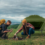 Collapsible camping tent with an integrated cot - Image 22
